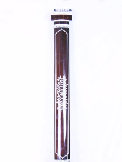 The neck of the Manu Shrivastava style tanpura, showing the delicate inlay pattern.