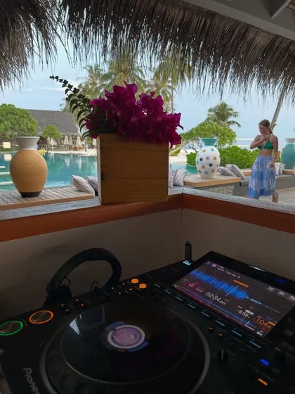 My view from the DJ booth at a beautiful poolside venue in the Maldives. This is the kind of experience that fuels my passion and my teaching.