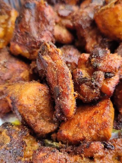 A close-up of my Curry Leaf Chicken Tikka from the Iftar Box menu. The chicken is marinated in a fragrant blend of spices and curry leaves, then grilled to perfection.