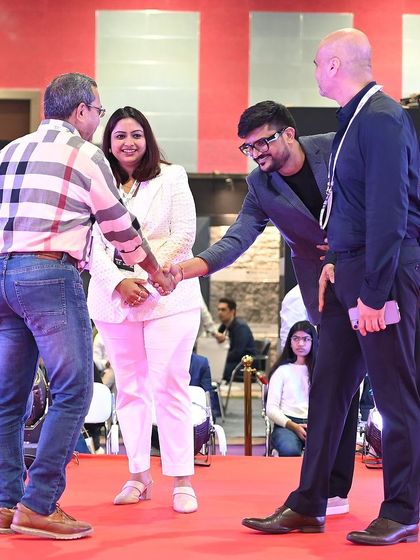 A moment of connection on stage at the Darc awards. We value building strong relationships with our peers and partners, as collaboration is key to pushing the boundaries of what's possible in our industry.