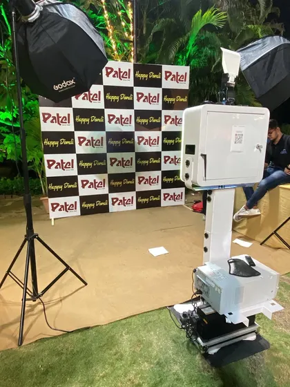 A photo booth with a custom step-and-repeat backdrop for the Patel 1949 Diwali event. This is an excellent option for reinforcing brand presence at corporate gatherings.