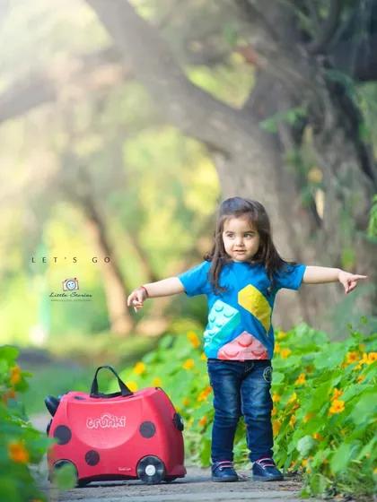 Pointing the way to the next adventure. I aim to capture the confidence and excitement of children as they explore the world around them.