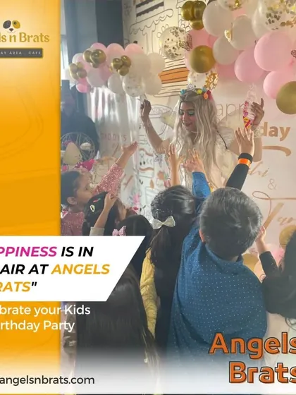 Happiness is definitely in the air here. This photo captures the pure joy of a birthday celebration, with kids reaching for balloons and having the time of their lives.