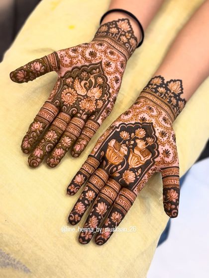 A gorgeous front-hand design for Rakhi, filled with lotus and swan motifs. The shading gives the flowers a beautiful depth.