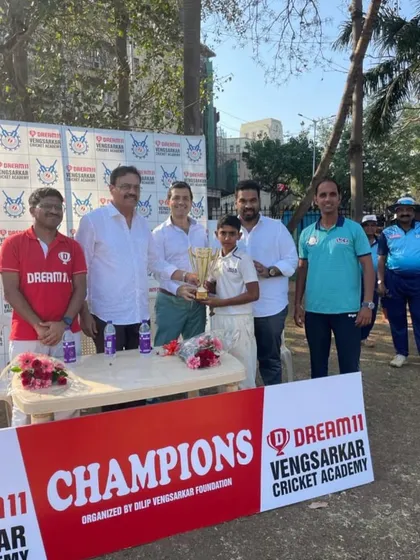 A young champion in the making, receiving his trophy at the Dream 11 Vengsarkar Cup prize distribution ceremony.