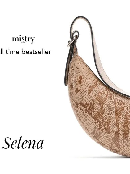Our all-time bestseller, the Selena. This graphic highlights the iconic shape and the new snake print texture, a favorite that continues to evolve.