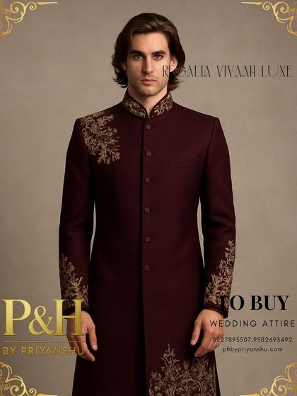 A close-up view of the wine Indo-Western suit, highlighting the detailed hand-embroidery on the collar, shoulder, and cuffs. The craftsmanship ensures a truly bespoke feel.