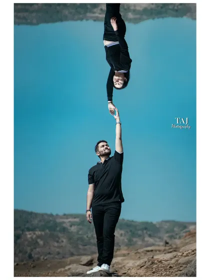 A playful and surreal creative portrait using reflections. This "upside down" shot is a fun and unique way to capture a couple's connection, creating an image that makes you look twice.