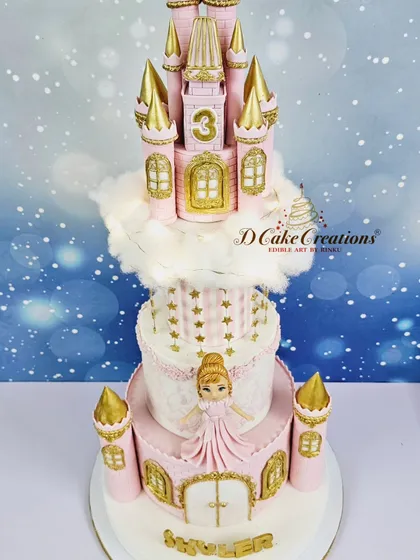 For a little princess's third birthday, I designed this magnificent four-tier castle cake. Complete with golden turrets, delicate sugar-spun clouds, and a beautiful princess figurine, it's a fairytale brought to life in pastel pink and gold.