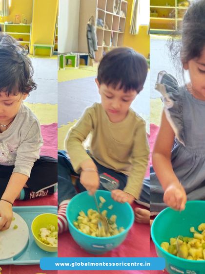 The fruit salad activity continues with children mixing different fruits in a bowl. This simple task teaches them about combining ingredients and develops their coordination.