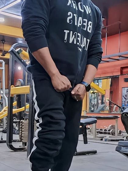 Getting ready for a set. Proper setup and mental focus are crucial before any lift.