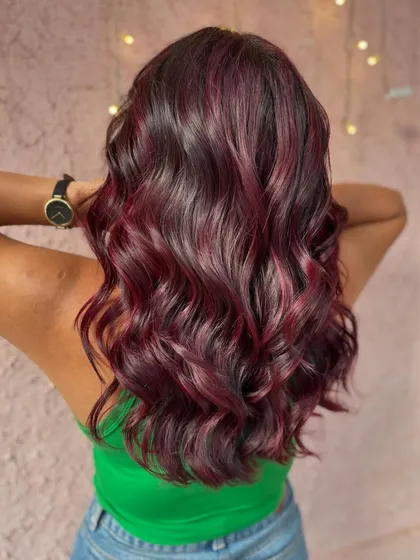 The back of this Valentine's red hair. The color is deep and rich, and the waves show off its dimension.