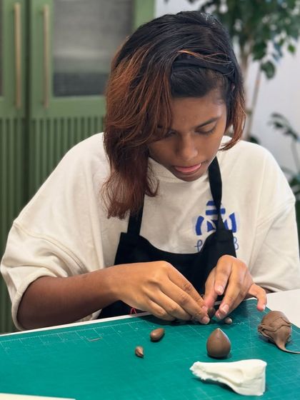 Concentration is key! Here, one of our young students is carefully crafting a small animal out of fondant. My classes provide a space for kids to focus, learn a new skill, and have fun doing it.