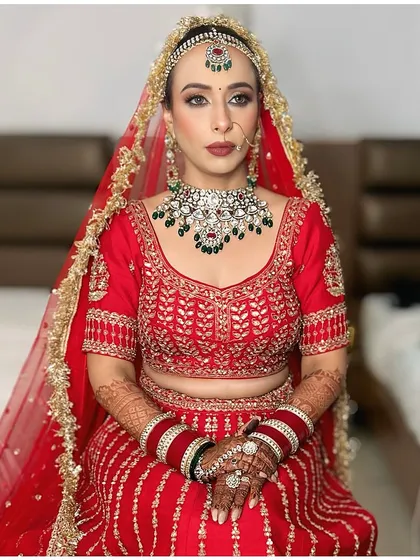 A timeless red lehenga paired with classic bridal makeup. I focused on defined eyes and a balanced base to create this elegant and traditional wedding look.