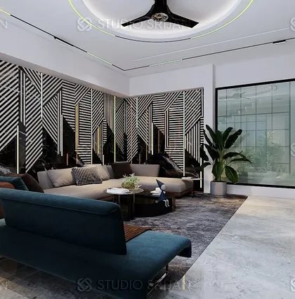 A modern living room with a bold, black-and-white geometric accent wall that adds a strong graphic element to the space.