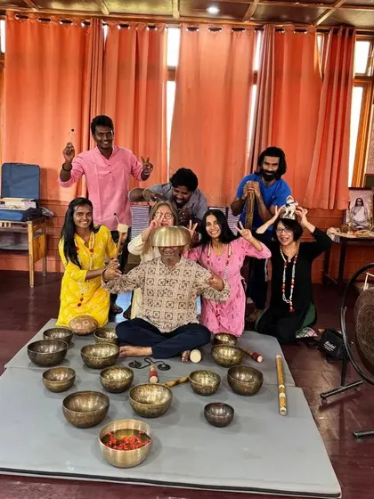 Another playful pose from our sound healing graduates, celebrating the end of a transformative course.