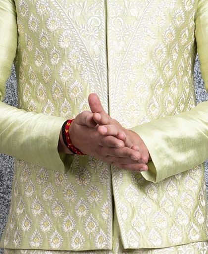 A close-up of the intricate Resham embroidery on our mint green bundi set. The delicate, tonal threadwork creates a beautiful texture perfect for elegant occasions.