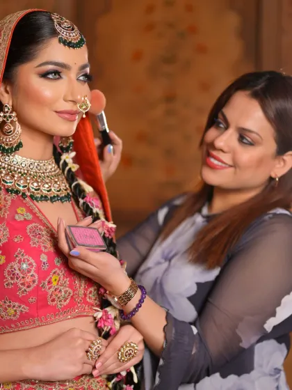 I believe in a personal touch, which is why I handle every bridal makeover myself. Here I am, adding the final touches to ensure every detail is perfect for this beautiful bride's special day.