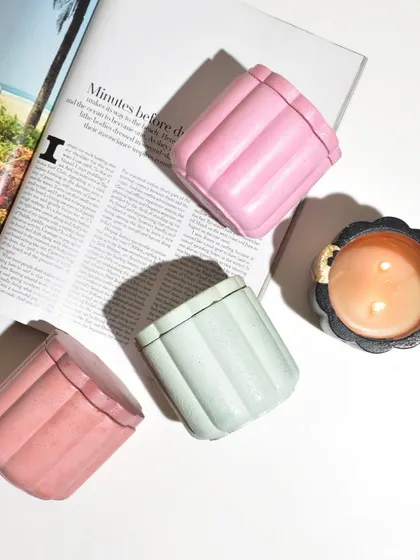A collection of our colorful Daisy Jars, a must-have for the festive season. They make great gifts and add a pop of color to any space.