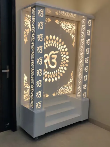 The mandir unit is designed to be a standalone piece of furniture that fits perfectly into a corner of the home.