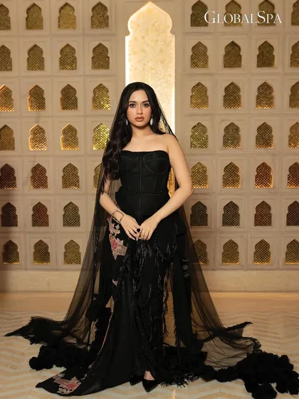 A full-length shot from the GlobalSpa editorial with Jannat Zubair. The opulent background and dramatic gown required careful lighting to balance the details of both the subject and her environment.