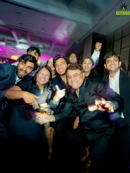 A candid group photo capturing the happy, chaotic energy of the party. These are the moments you'll look back on and smile.