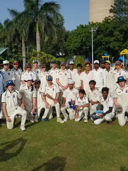 Our academy team standing with players from New Zealand. I believe in providing unique opportunities and real match experience, including exposure to international players.