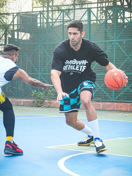 A player working on his handles during a group session. The intensity is high as players push each other.