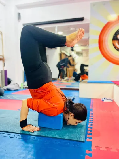 A solid forearm stand practice using a block for stability. This is an excellent preparation for lifting into Scorpion Pose and other challenging backbends.