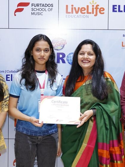 Posing with a student performer and fellow educators at the Eldrok Mumbai Summit. It is wonderful to see young talent being recognized at such a prestigious event.