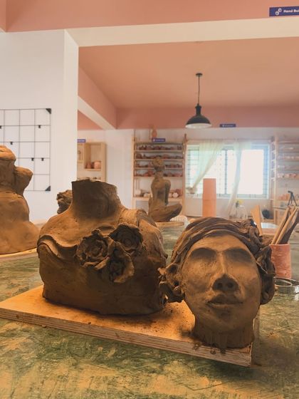 Day 1 at our sculpture workshop. A student's work in progress, a beautiful bust with floral details.