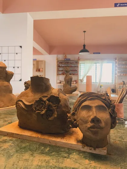 Day 1 at our sculpture workshop. A student's work in progress, a beautiful bust with floral details.