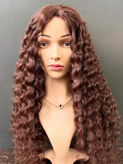 Our premium curly wig in dark brown offers amazing volume and length. It's comfortable for everyday use and glamorous enough for special occasions.
