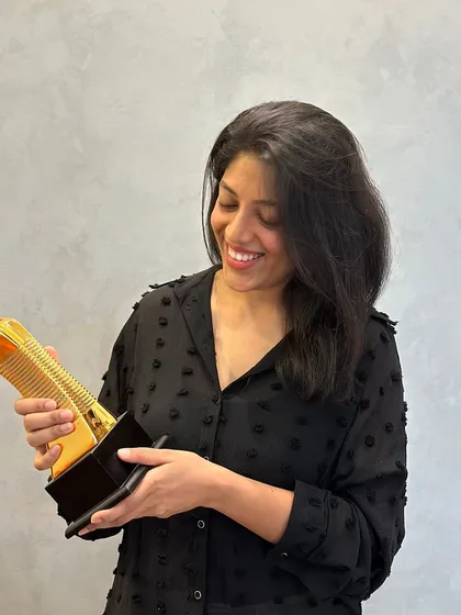 We won Gold! Sonal holding our WADE ASIA award for 'Kābu'. We are so happy and grateful to the jury for recognizing the quiet confidence and subtle beauty of this home's color story.