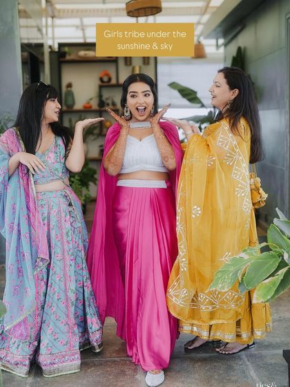 The bride tribe having fun under the sun. We ensure every part of the wedding celebration, including the Mehendi and Haldi, is filled with picture-perfect moments for the bride and her friends.