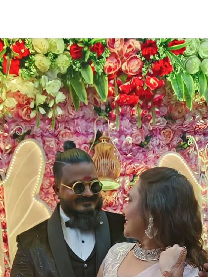 A glamorous couple ready for their close-up. The groom's stylish tuxedo and the bride's elegant saree and jewellery set are both available for rent from our collection.