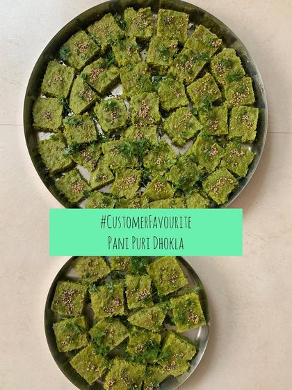 A large platter of Pani Puri Dhokla, perfect for a party.