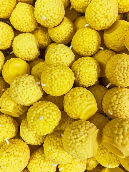 A big batch of our favorite Ladoo candles, ready for the festive season. Each one is crafted to look like a delicious sweet, adding a unique charm to your celebrations.