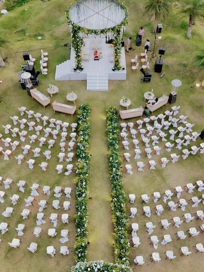 An aerial view of our 'Luxe Garden' wedding concept. You can see how we designed the entire space, from the grand circular mandap on the hill to the elegant guest seating, creating a cohesive and breathtaking experience. This is what large scale, thoughtful design looks like.