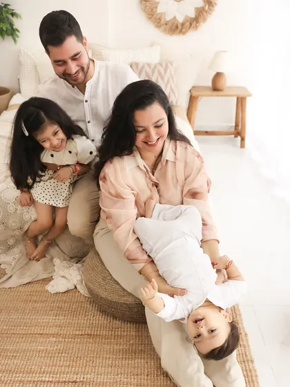 Upside-down giggles and family fun. I love capturing the playful, real-life moments that happen during a session. This image of a family laughing together is a perfect example of authentic, joyful connection.