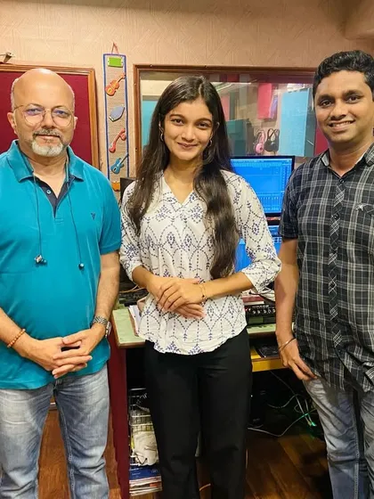 Standing with my collaborators after a successful recording session for a Ganpati song. Working with experienced artists is always a huge learning experience for me.