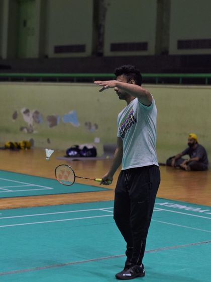 Explaining the nuances of a shot. Small adjustments in technique can make a big difference, and I pay close attention to these details.