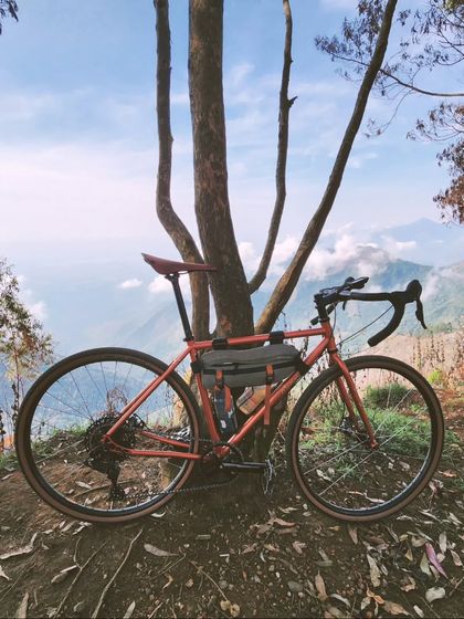 This gravel bike, set against a stunning mountain vista, represents the spirit of adventure that drives us. It's about getting off the beaten path and finding the most incredible places to ride.
