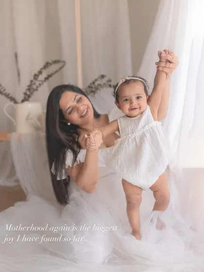 The pure joy on both their faces says it all. These authentic, happy moments are the heart and soul of my motherhood photography sessions.