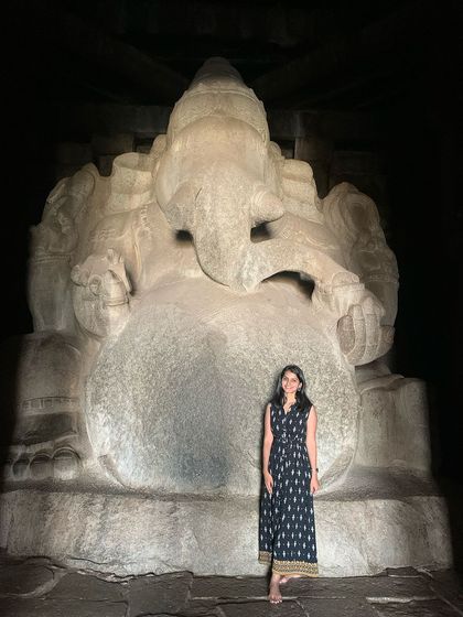 Standing next to the giant Sasivekalu Ganesha statue in Hampi.