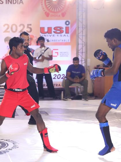 A striking exchange during a match at the FMAAI National Championship. Our fighters are comfortable and effective whether the fight is standing or on the ground.