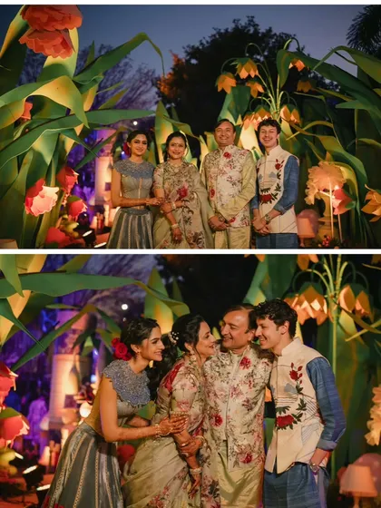 Family portraits are a must. Here, the family poses amidst giant, fantastical flowers, a fun and unique backdrop that ties into the event's whimsical theme.
