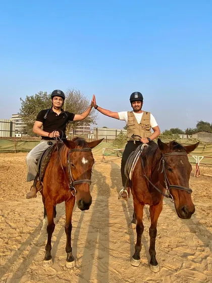 A high-five between two friends after a great ride. We love seeing our community support and encourage each other.
