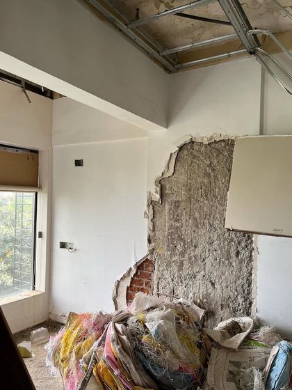 A "before" shot showing the raw state of the apartment. We saw the potential in this space to create something truly unique, envisioning where walls would be sculpted and new finishes would bring the design to life.