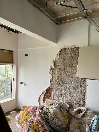 A "before" shot showing the raw state of the apartment. We saw the potential in this space to create something truly unique, envisioning where walls would be sculpted and new finishes would bring the design to life.